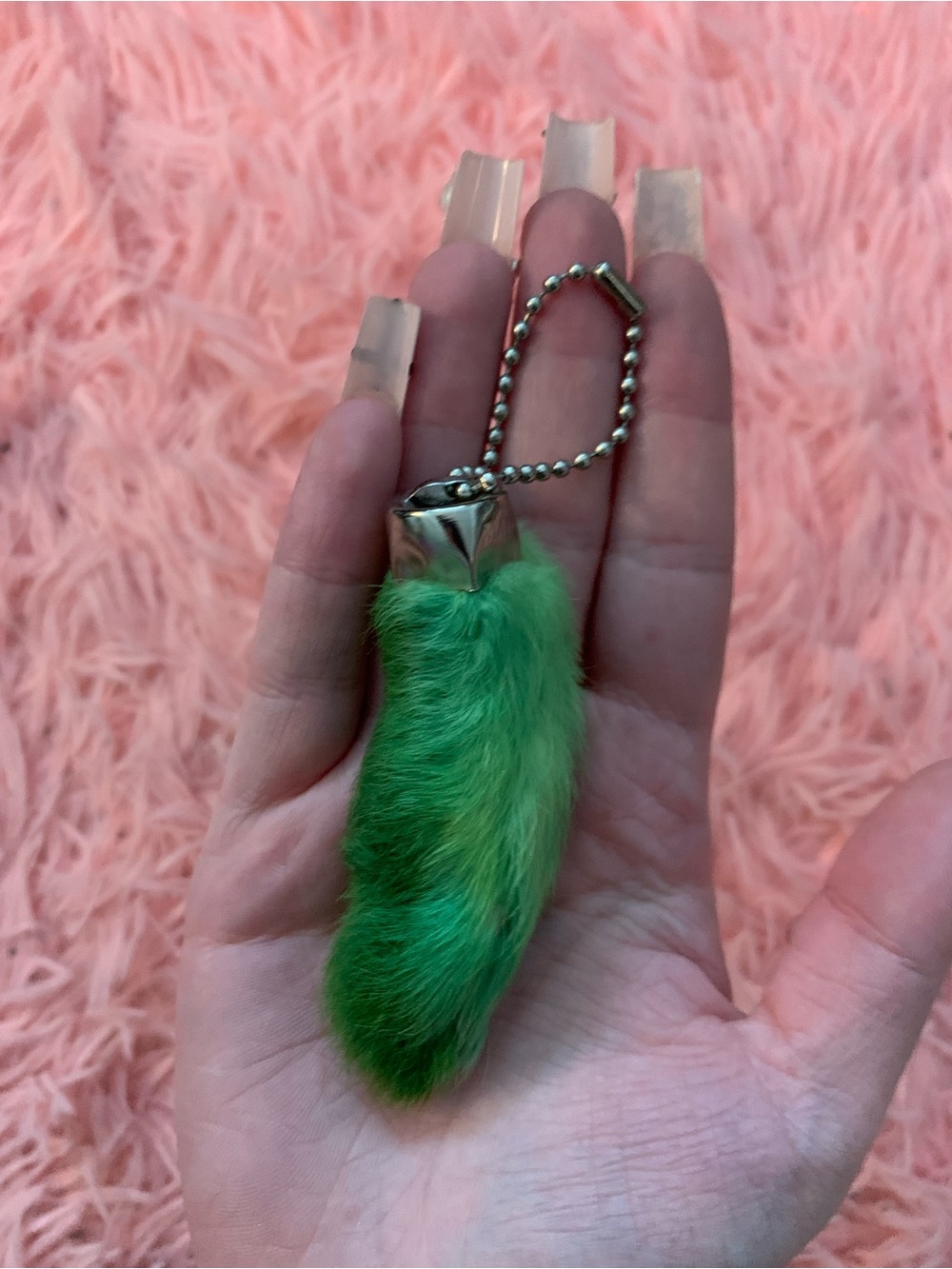 Green rabbits foot keychain